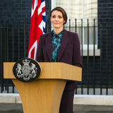 Hostage 2025 Abigail Dalton Suit
